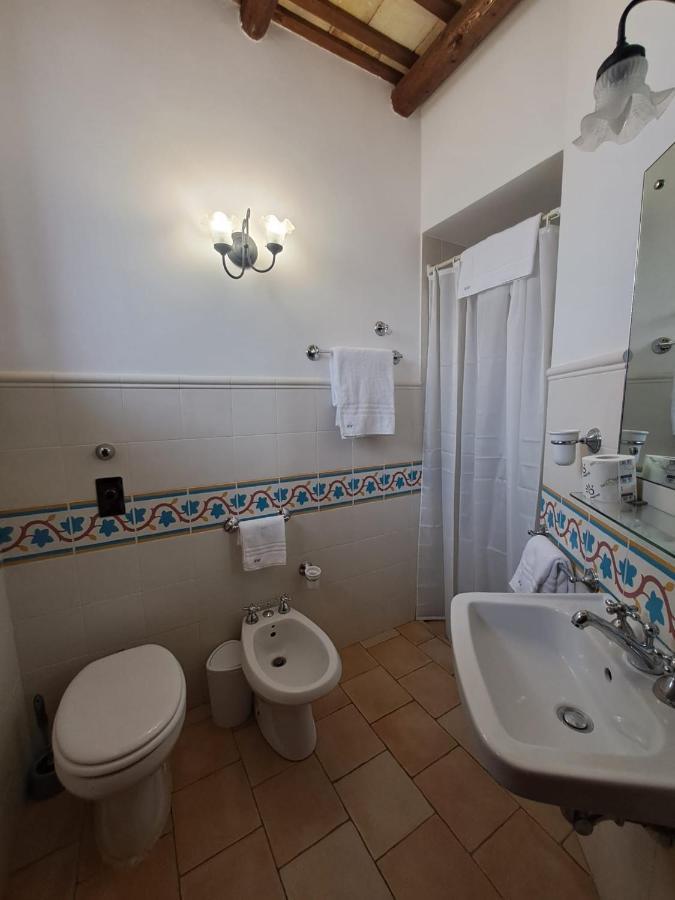 Hotel Cala Buguto Кустоначи Экстерьер фото