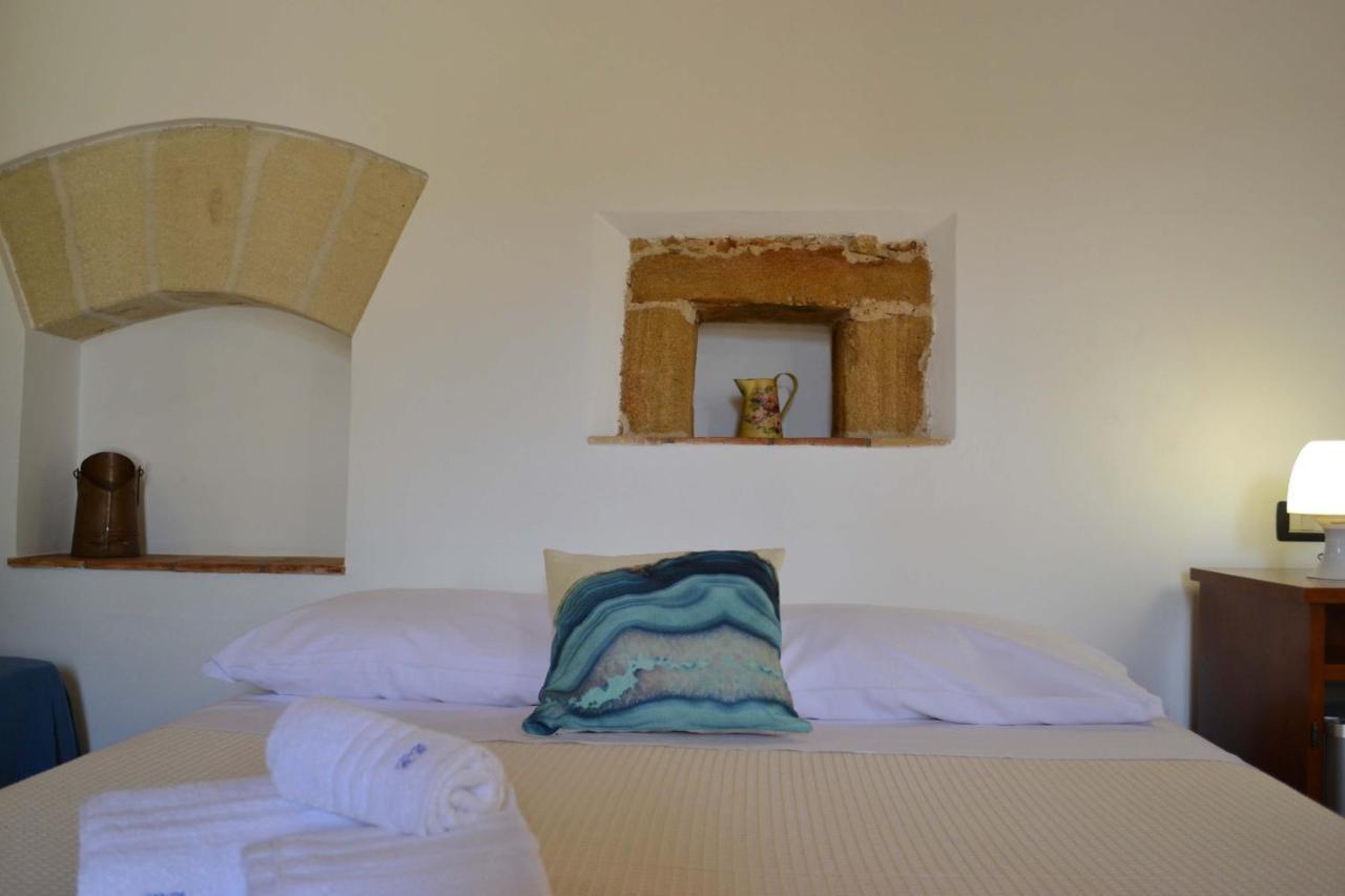 Hotel Cala Buguto Кустоначи Экстерьер фото