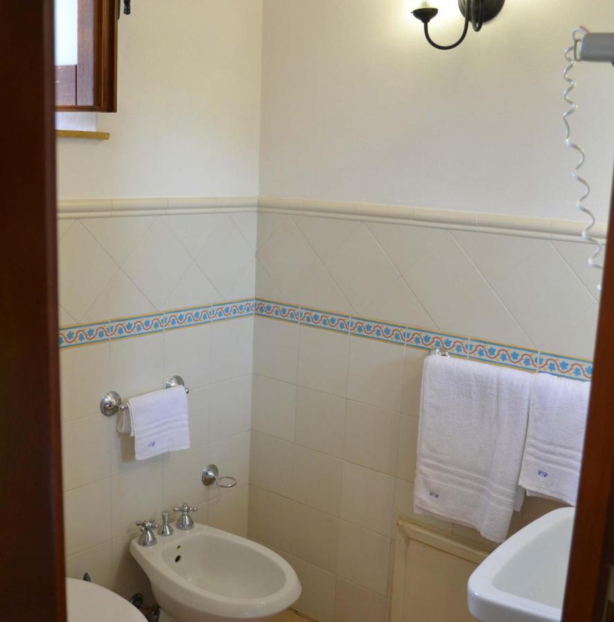 Hotel Cala Buguto Кустоначи Экстерьер фото