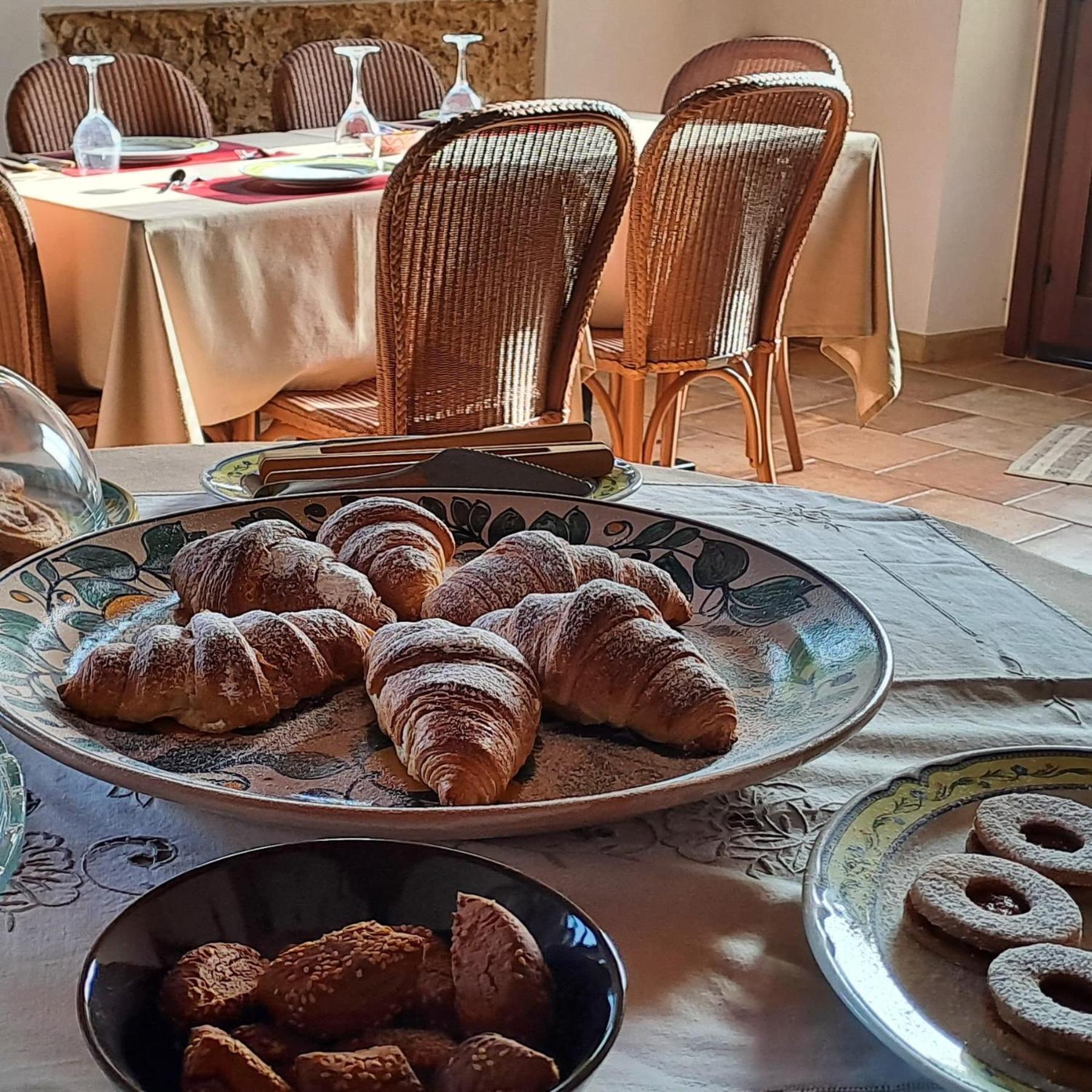 Hotel Cala Buguto Кустоначи Экстерьер фото